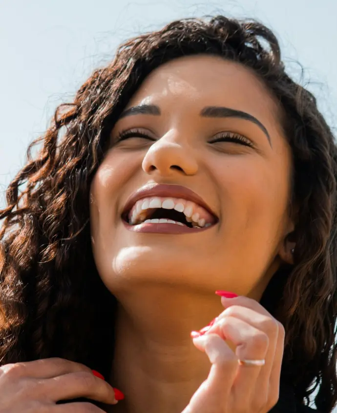 woman with brown hair smiling