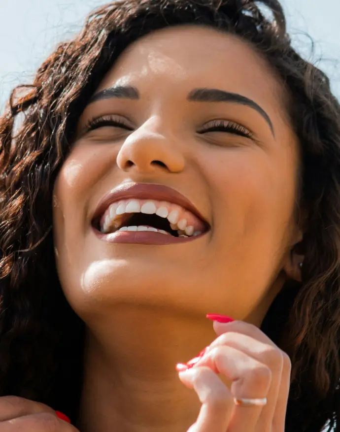 woman with brown hair smiling