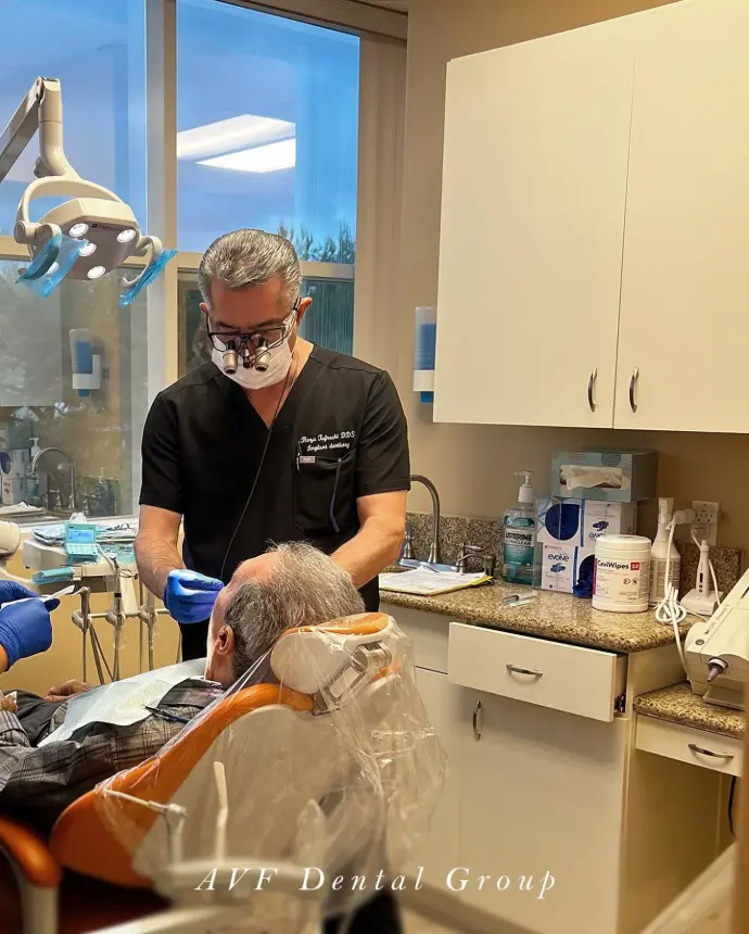 Dr Reza Tafreshi dentist in practice